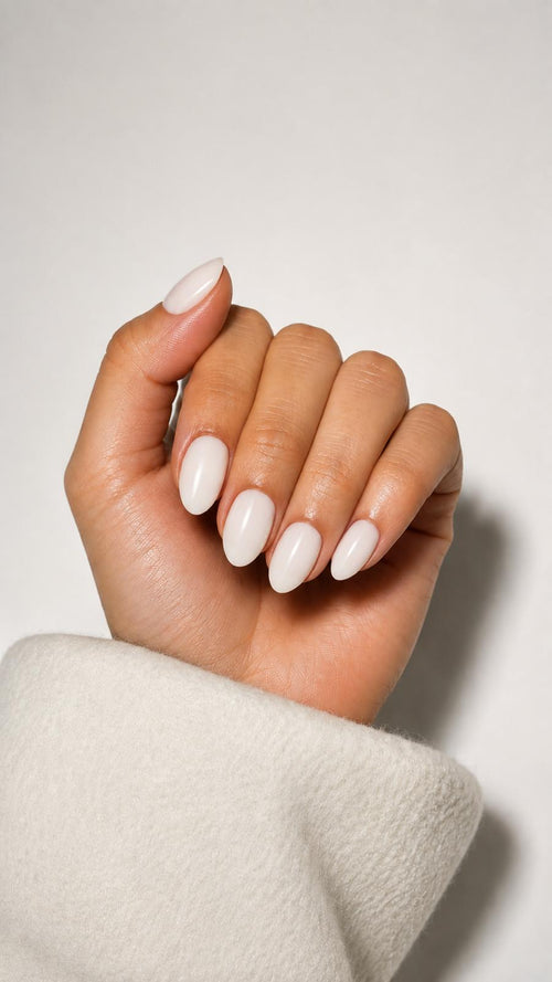 SYLK Nails. Coco Press-On Nails with in milky white and coconut finish, short almond.